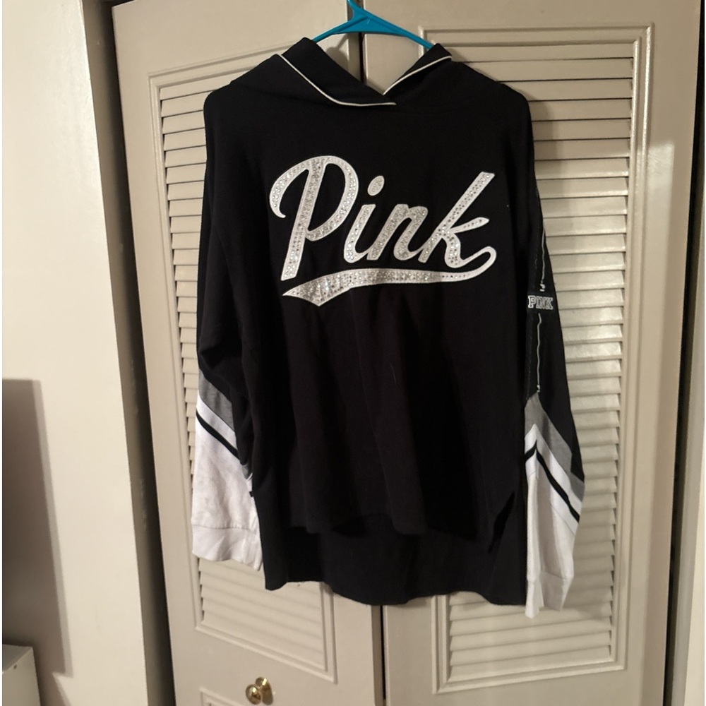 A pink bean hoodie, size large, worn like 5 times for short periods of time.